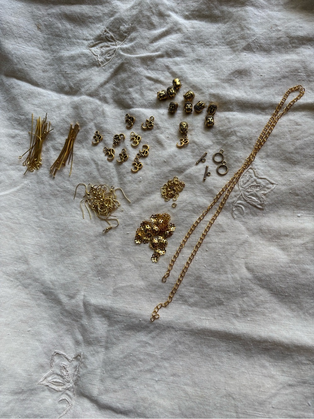 Buddha head spacers, OM charms, boho jewelry, yoga Gold tone jewelry making lot